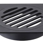 Black Square Floor Grate with slotted design, 110x110mm size, and 100mm outlet, modern bathroom drainage solution.