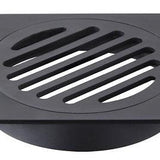 Black Square Floor Grate with slotted design, 110x110mm size, and 100mm outlet, modern bathroom drainage solution.